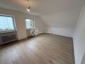 Kernsanierte DG-Wohnung in ruhiger Lage - Wohnzimmer52