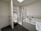 Moderne 2-Zimmer-Wohnung mit ruhiger Süd-Loggia, Aufzug und lichtdurchfluteter Einbauküche - Badezimmer105
