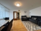Großzügige 3-Zimmer-Wohnung mit zwei Balkonen, Schwimmbad, lichtdurchflutet und Top-Anbindung - Wohnzimmer108