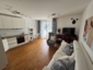 Möblierter Neubau mit Balkon - Wohnzimmer42